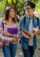 Two young students walking to class